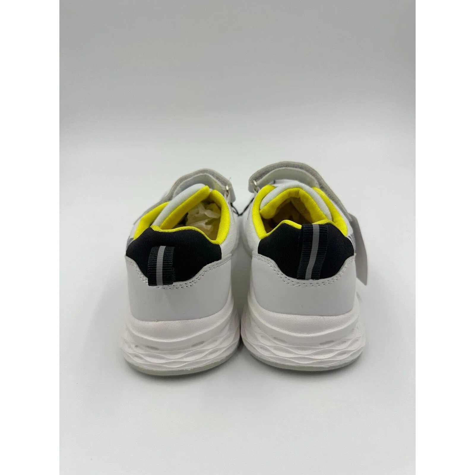 Big Kids Size 4 white and yellow running sneakers