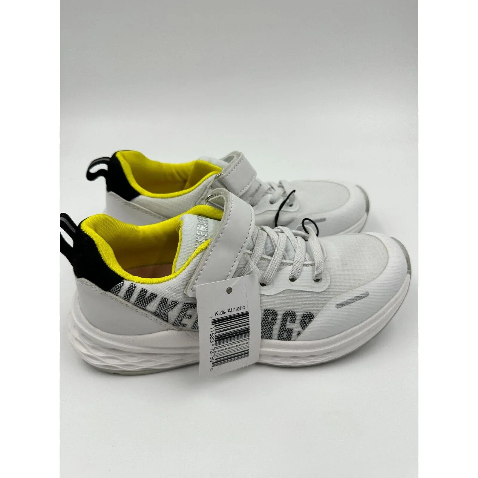 Big Kids Size 4 white and yellow running sneakers