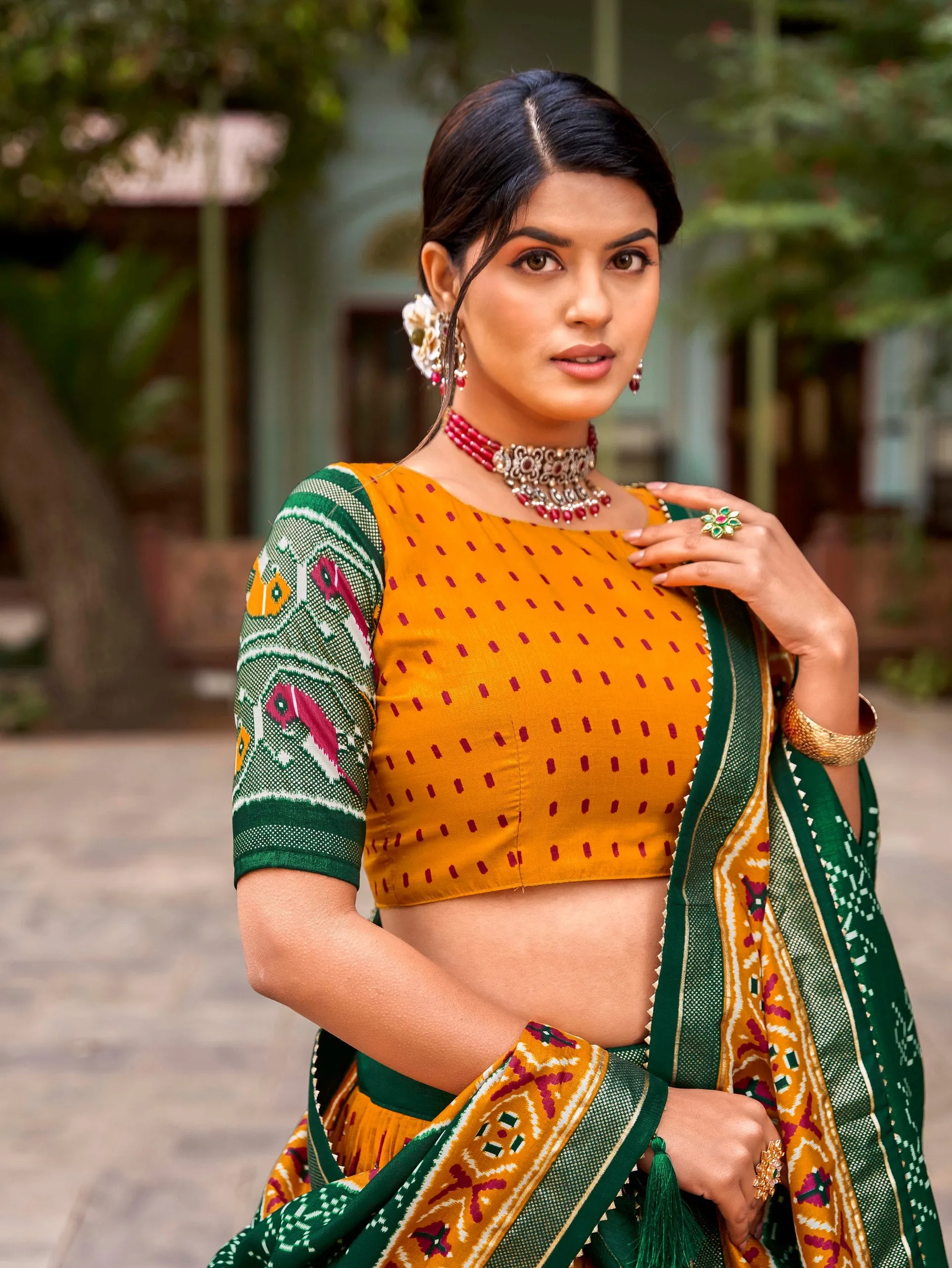 Mustard Tussar Silk Lehenga Choli with Enchanting Ikat Patola Print and Foil Work