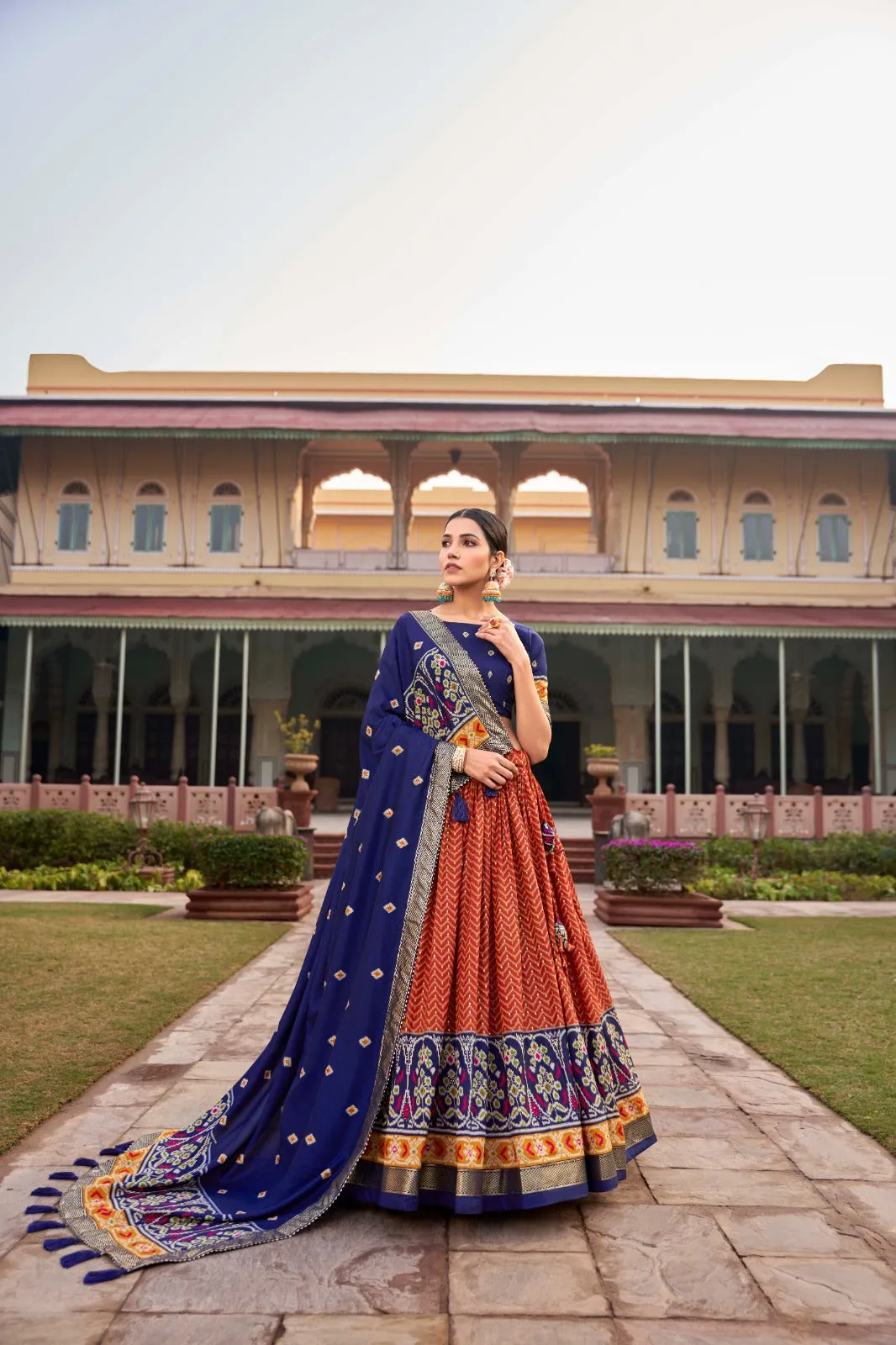 Orange Captivating Tussar Silk Patola Printed Lehenga Choli Set