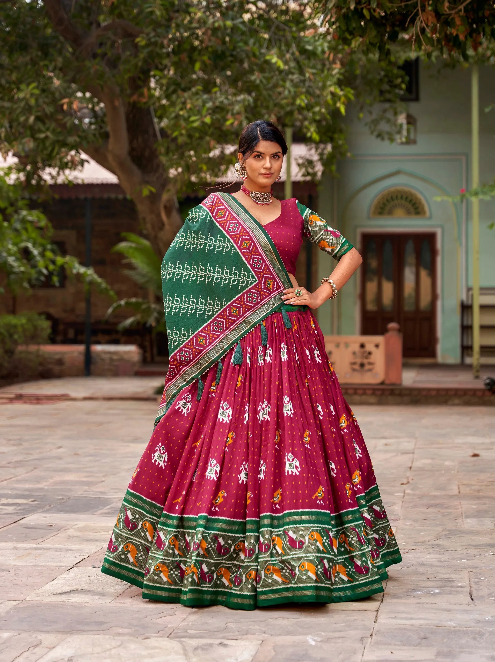 Red Tussar Silk Lehenga Choli with Enchanting Ikat Patola Print and Foil Work