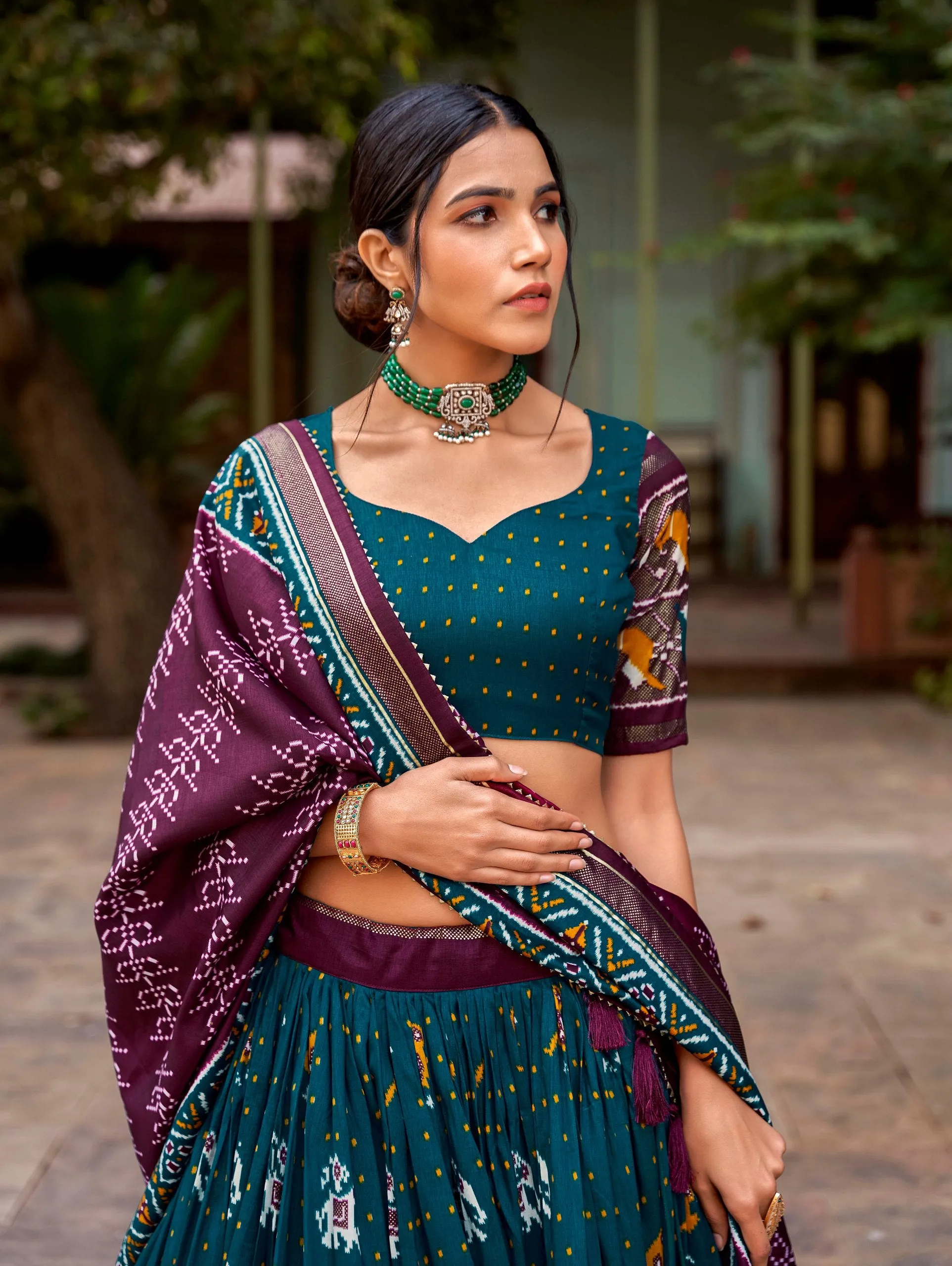 Teal Tussar Silk Lehenga Choli with Enchanting Ikat Patola Print and Foil Work